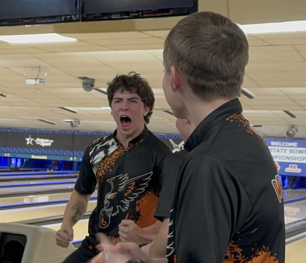 Senior Trayvn Sullivan cheers after they punched their ticket to state.
