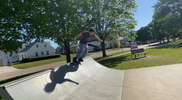Kaiden Haas (12) skates at the Manchester, Iowa skate park.