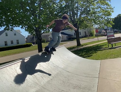 Kaiden Haas (12) skates at the Manchester, Iowa skate park.